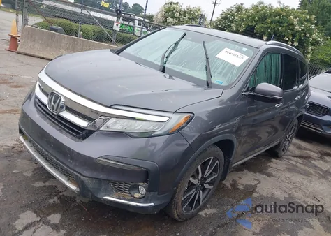 2020 Honda Pilot Awd Touring 7 Passenger z USA, uszkodzony, nr VIN 5FNYF6H67LB006686